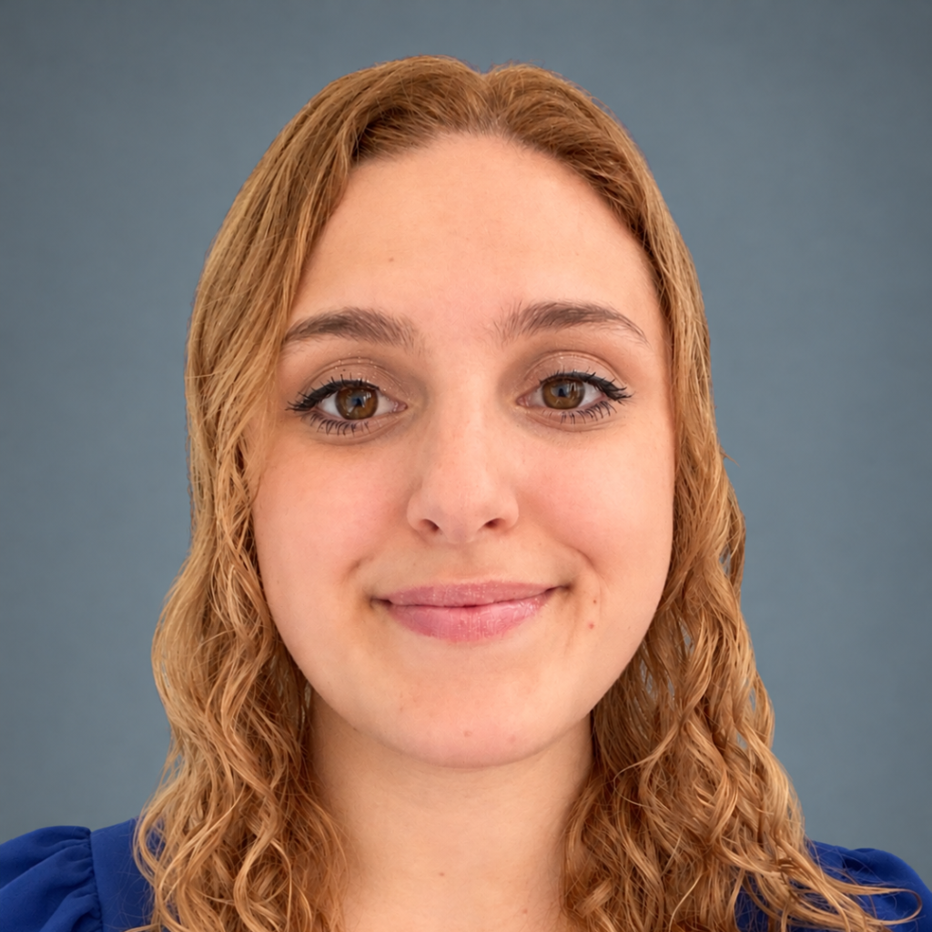 Curly-Haired Woman in Blue Top